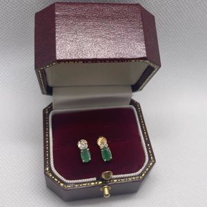 Genuine diamonds, and 10k emerald earrings